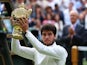 Carlos Alcaraz celebrates winning the Wimbledon title on July 16, 2023