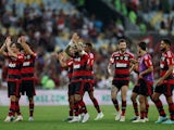 Flamengo players applaud fans after the match on July 16, 2023