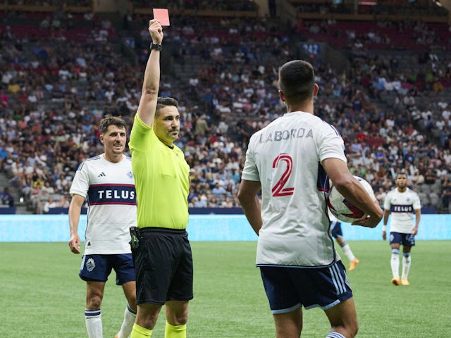 Vancouver Whitecaps defender Mathias Laborda (2) receives a red card on July 9, 2023