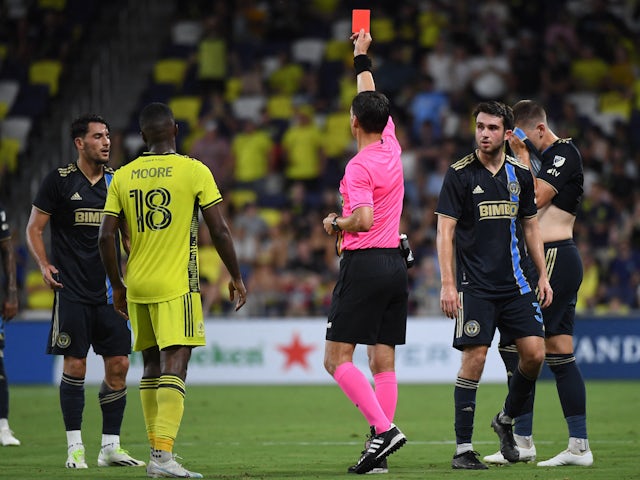 Nashville SC defender Shaq Moore (18) and Philadelphia Union forward Julian Carranza (9) are issues a red card on July 13, 2023