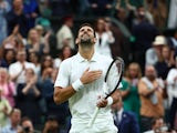 Novak Djokovic reacts at Wimbledon on July 14, 2023