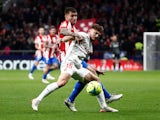 Atletico Madrid's Angel Correa in action with Mallorca's Pablo Maffeo on December 4, 2021