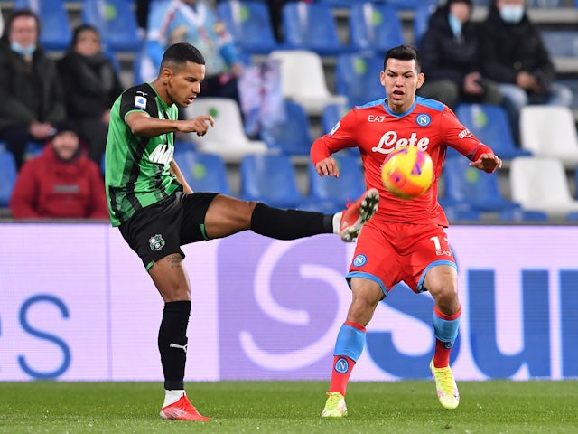 Sassuolo's Rogerio in action with Napoli's Hirving Lozano in December 2021