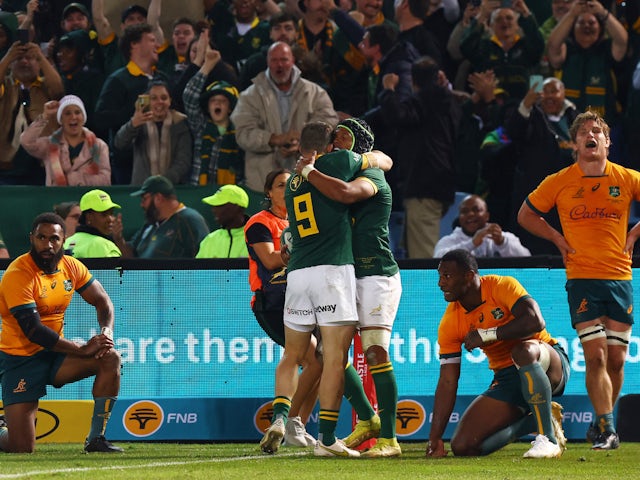 South Africa's Kurt-Lee Arendse celebrates scoring their third try with Cobus Reinach on July 8, 2023