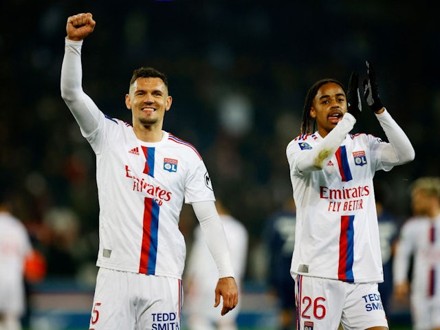 Olympique Lyonnais' Dejan Lovren and Bradley Barcola celebrate after the match on April 2, 2023