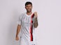 Christian Pulisic models the AC Milan 2023-24 away kit