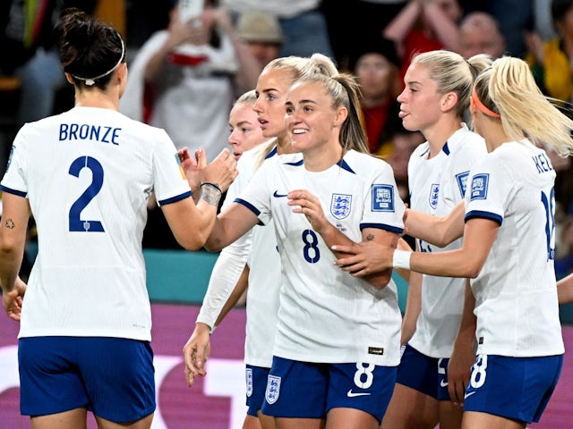 England's Georgia Stanway celebrates scoring their first goal with teammates on July 22, 2023