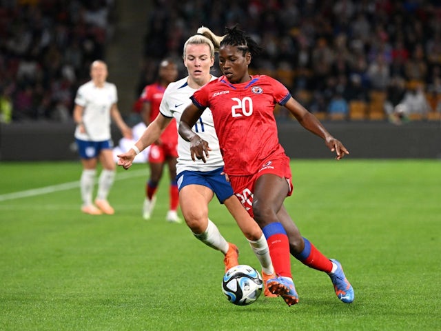 England's Lauren Hemp in action with Haiti's Kethna Louis on July 22, 2023