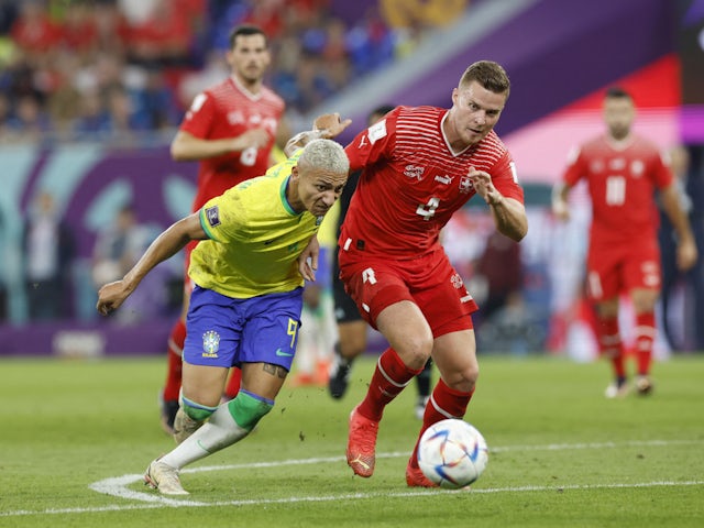 Switzerland defender Nico Elvedi competing against Brazil forward Richarlison at the World Cup in November 2022.
