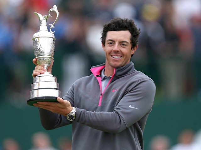 Rory McIlroy celebrates winning the Open Championship with the Claret Jug on July 20, 2014