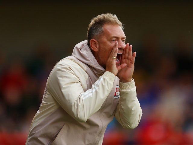 Classy Crawley promoted to League One after Crewe victory