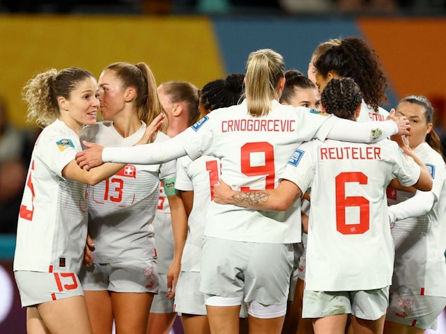 Switzerland's Seraina Piubel celebrates scoring their second goal with teammates on July 21, 2023
