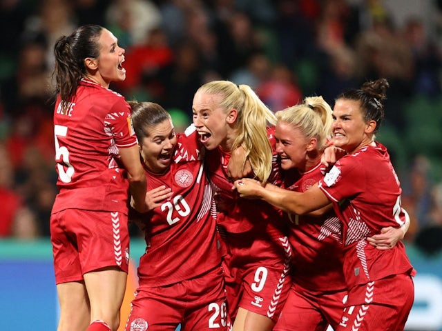 Denmark's Amalie Vangsgaard celebrates scoring their first goal with teammates on July 22, 2023