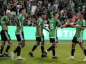 Austin FC midfielder Ethan Finlay (13) celebrates with teammates after scoring a goal on July 30, 2023