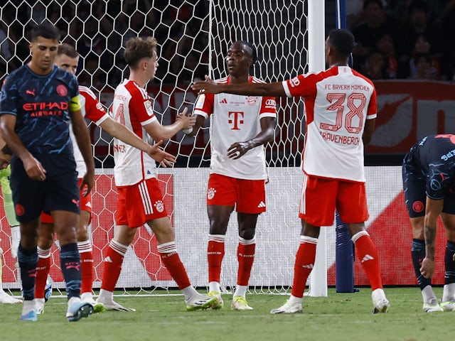 Bayern Munich's Mathys Tel celebrates scoring their first goal with teammates on July 26, 2023