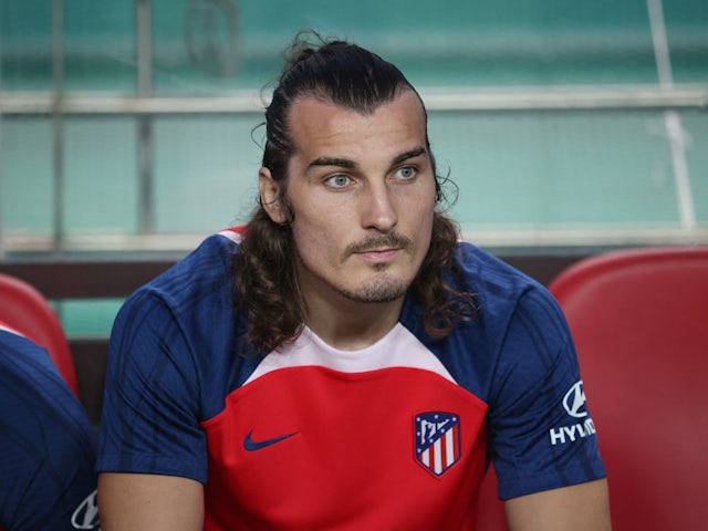 Atletico Madrid's Caglar Soyuncu looks on from the substitutes bench on July 27, 2023
