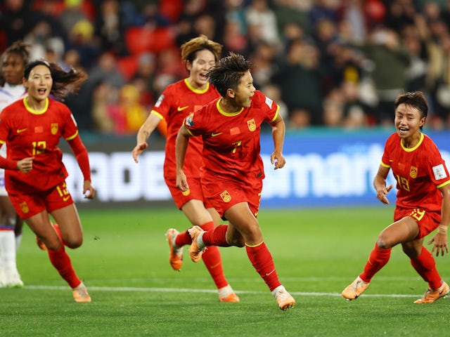 China Women's Wang Shuang celebrates scoring their first goal with teammates on July 28, 2023