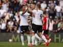 Derby County's Korey Smith celebrates scoring their first goal with teammates on July 29, 2023