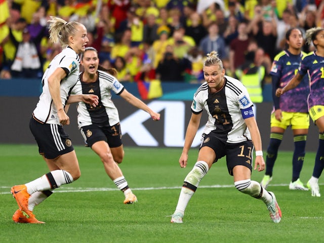 Germany Women's Alexandra Popp celebrates scoring their first goal with teammates on July 30, 2023
