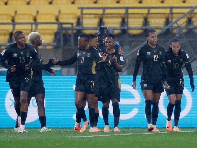 South Africa's Hildah Magaia celebrates scoring their first goal with Bongeka Gamede and teammates on July 23, 2023