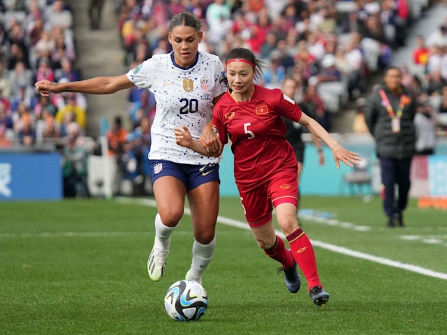 Vietnam defender Hoang Thi Loan battles for the ball with USA forward Trinity Rodman on July 22, 2023