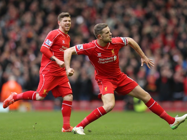 Jordan Henderson celebrates scoring for Liverpool against Manchester City on March 1, 2015