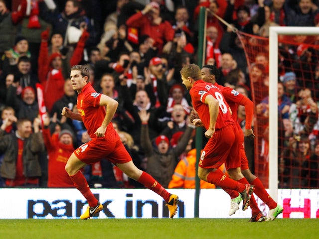 Jordan Henderson celebrates scoring for Liverpool against Norwich City on January 19, 2013
