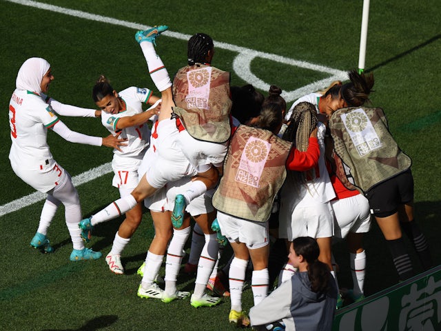 Morocco Women's Ibtissam Jraidi celebrates scoring their first goal with teammates on July 30, 2023