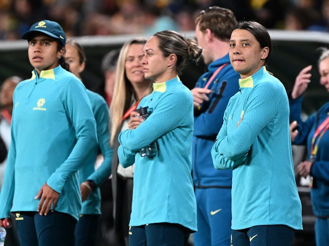 Australia's Sam Kerr watches from the sideline during the warm up before the match on July 27, 2023