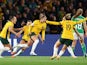 Australia's Steph Catley celebrates scoring their first goal with Hayley Raso and Caitlin Foord on July 20, 2023