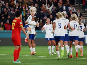 England crush China to cruise into knockout stages