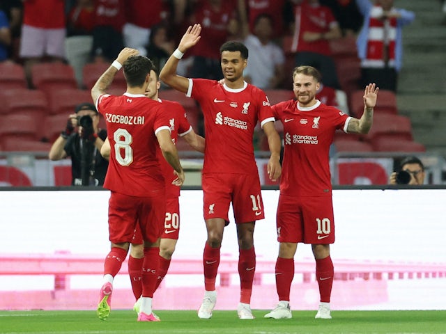 Liverpool's Cody Gakpo celebrates scoring their first goal with Alexis Mac Allister, Diogo Jota and Dominik Szoboszlai on August 2, 2023