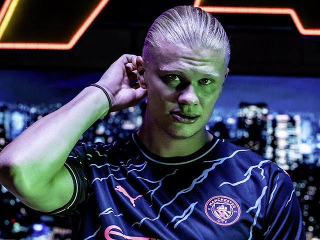 Erling Haaland models Man City's third kit for 2023-24