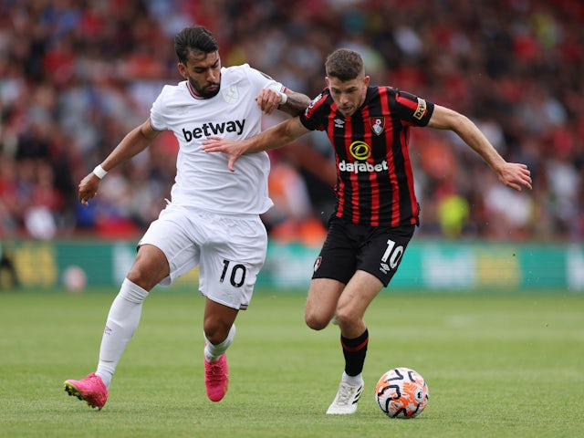 West Ham United's Lucas Paqueta in action with Bournemouth's Ryan Christie on August 12, 2023