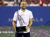 Dan Evans pictured with the Citi Open trophy on August 7, 2023