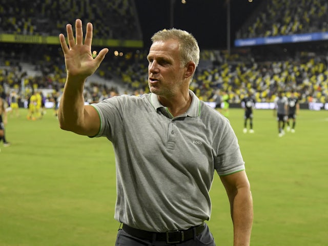 Nashville SC head coach Gary Smith waves to the crowd on August 10, 2023