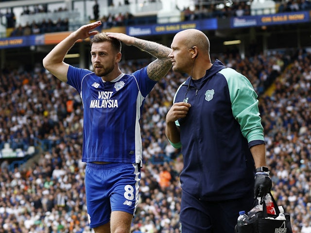 Cardiff City's Joe Ralls reacts as he is substituted after sustaining an injury on August 6, 2023
