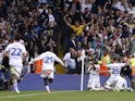 Leeds United's Crysencio Summerville celebrates scoring their second goal with teammates on August 6, 2023