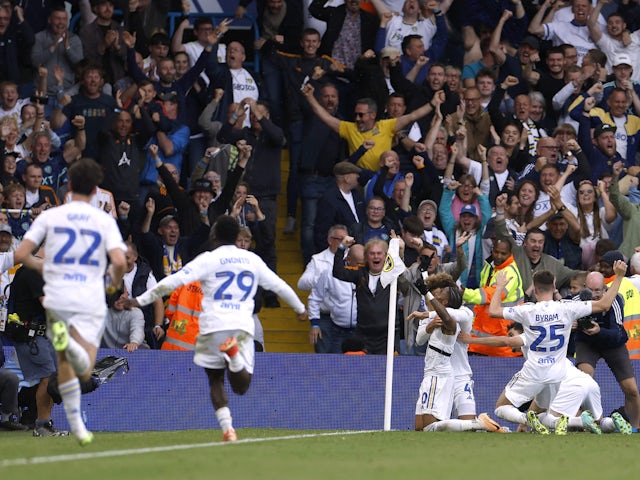 Leeds United's Crysencio Summerville celebrates scoring their second goal with teammates on August 6, 2023