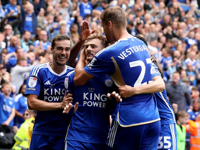 Leicester City's Kiernan Dewsbury-Hall celebrates scoring their second goal with Harry Winks and teammates on August 6, 2023