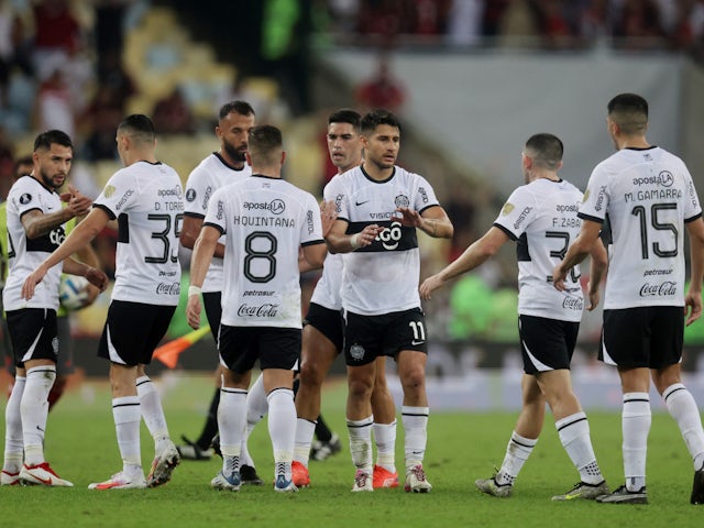 Olimpia's Ivan Torres with teammates after the match on August 4, 2023