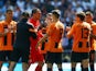 Shakhtar Donetsk's Andriy Pyatov is given a guard of honour by teammates after he was substituted on August 6, 2023