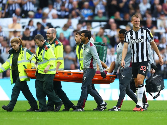 Aston Villa's Tyrone Mings is carried off the pitch in a stretcher after sustaining an injury on August 12, 2023