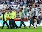 Aston Villa's Tyrone Mings is carried off the pitch in a stretcher after sustaining an injury on August 12, 2023