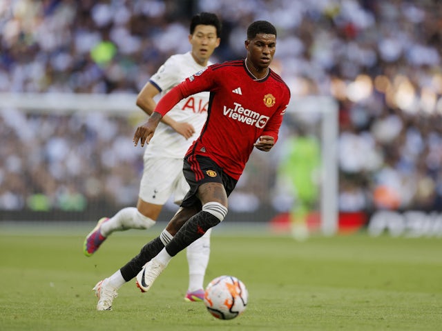 Manchester United's Marcus Rashford in action with Tottenham Hotspur's Son Heung-min on August 19, 2023
