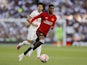 Manchester United's Marcus Rashford in action with Tottenham Hotspur's Son Heung-min on August 19, 2023