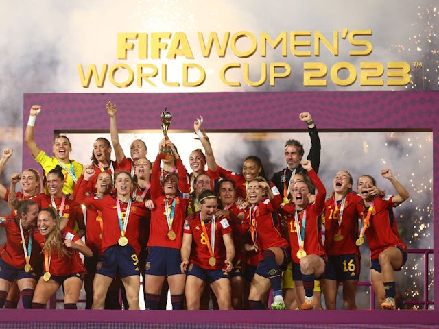 Spain players celebrate with the trophy after winning the Women's World Cup on August 20, 2023