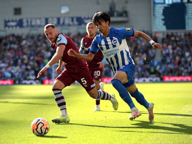 West Ham United's Vladimir Coufal in action with Brighton & Hove Albion's Kaoru Mitoma on August 26, 2023
