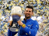 Novak Djokovic poses with the trophy after winning the Cincinnati Masters on August 20, 2023