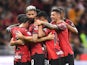 AC Milan's Olivier Giroud celebrates scoring their second goal with teammates on August 26, 2023
